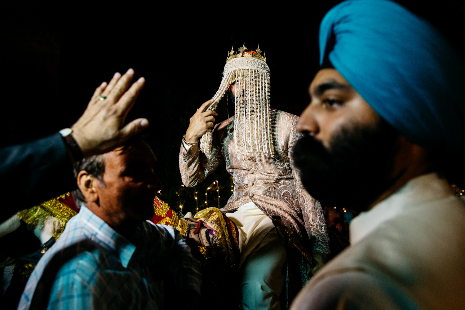 Groom on decorated horse