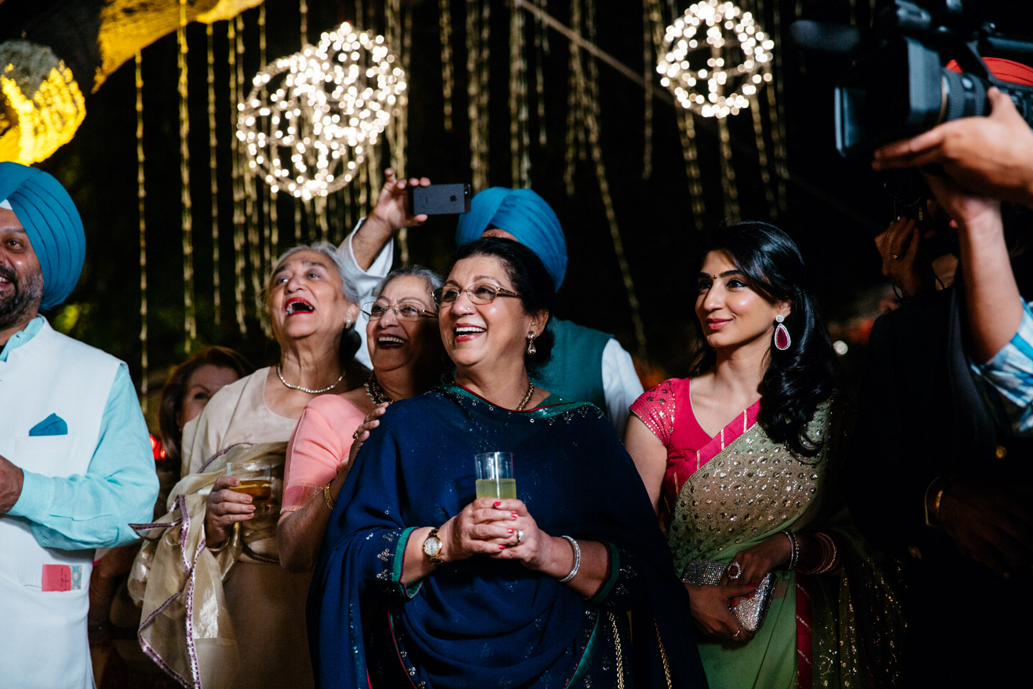 Family laughing and looking up