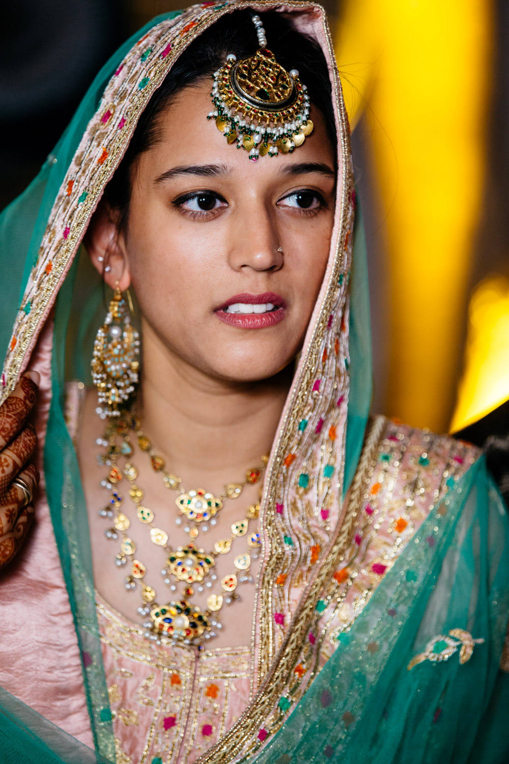 Bride — face and jewelry in serene portrait