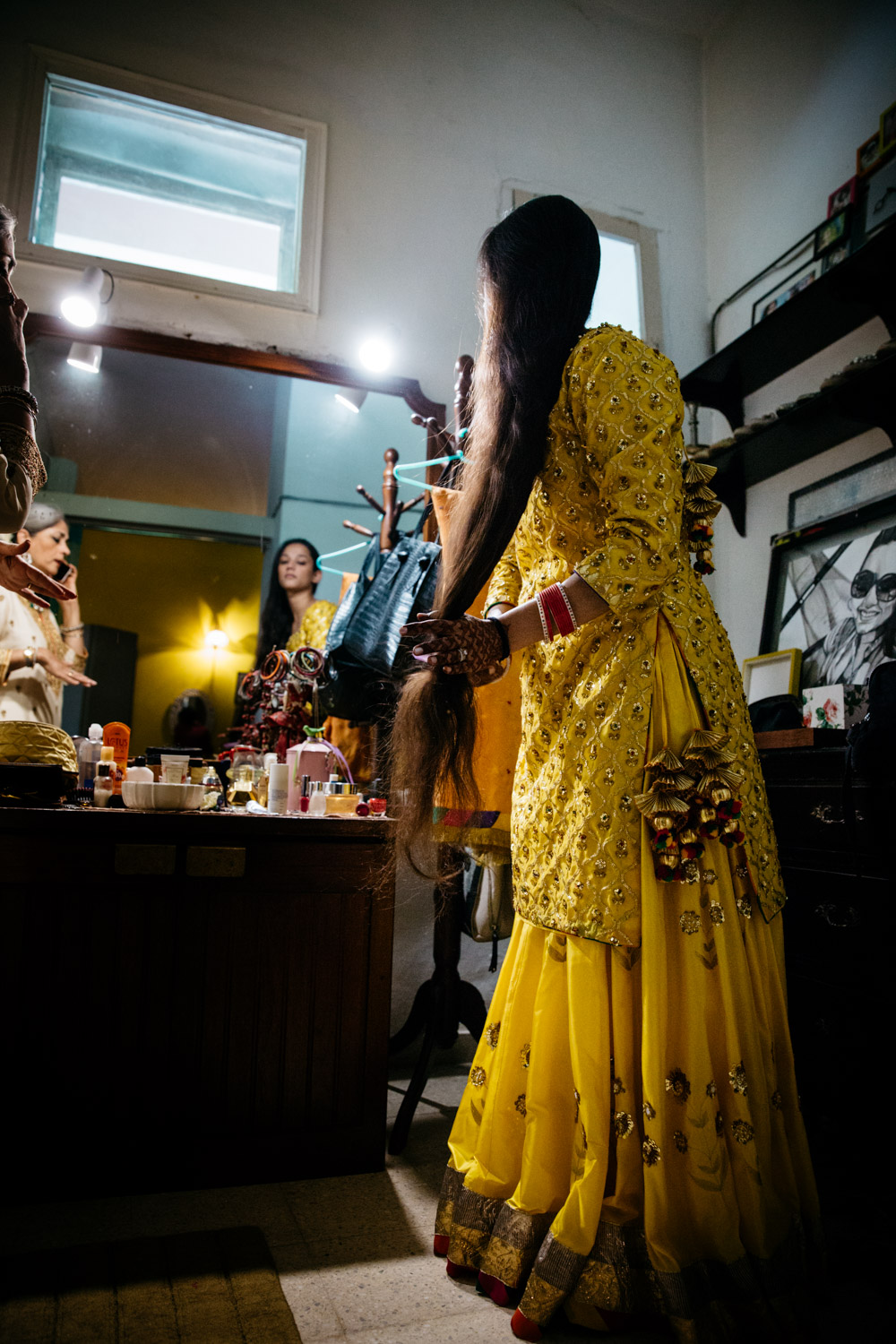 Back of bride's head, golden jewelry in hair