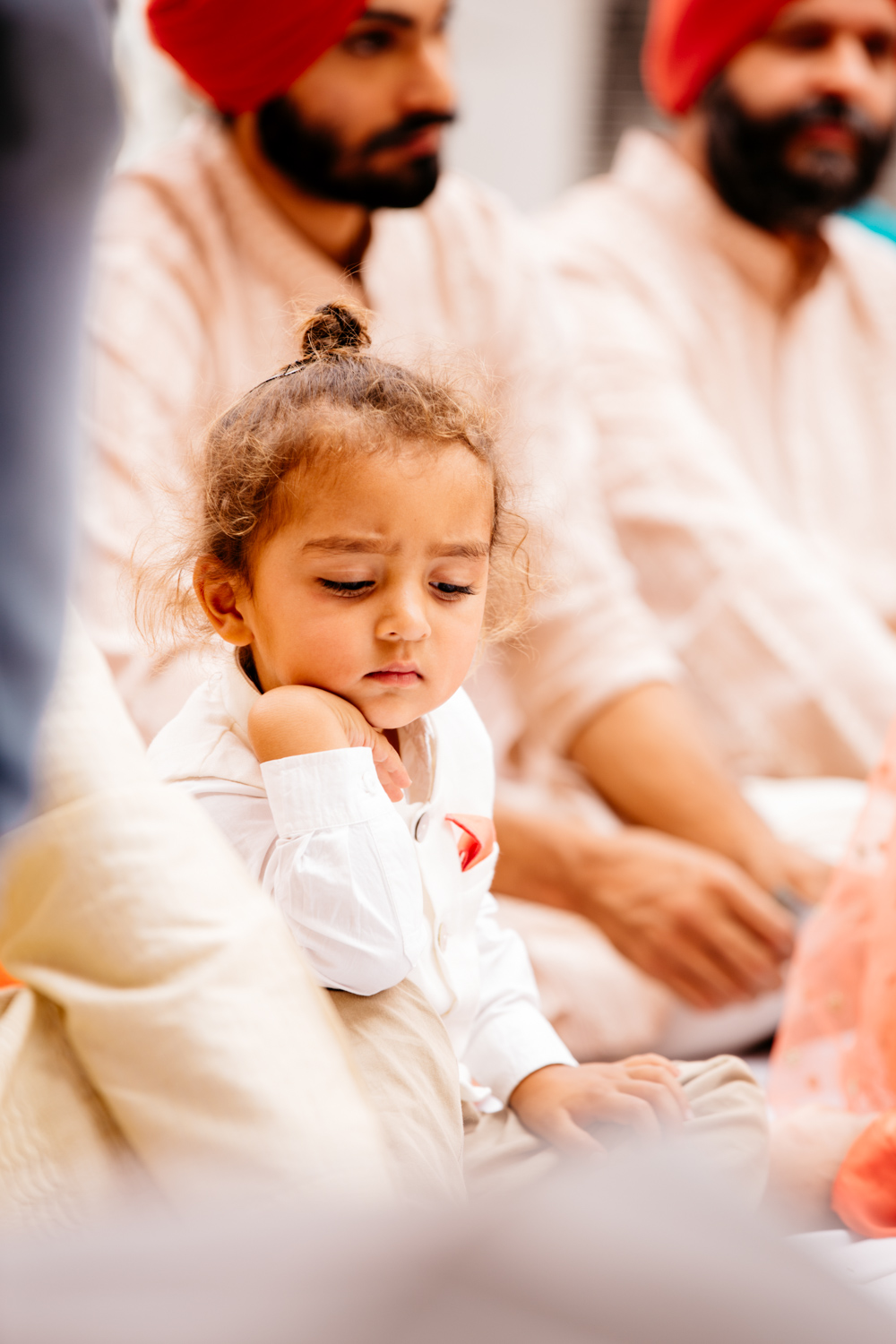 Bored child resting chin on hand