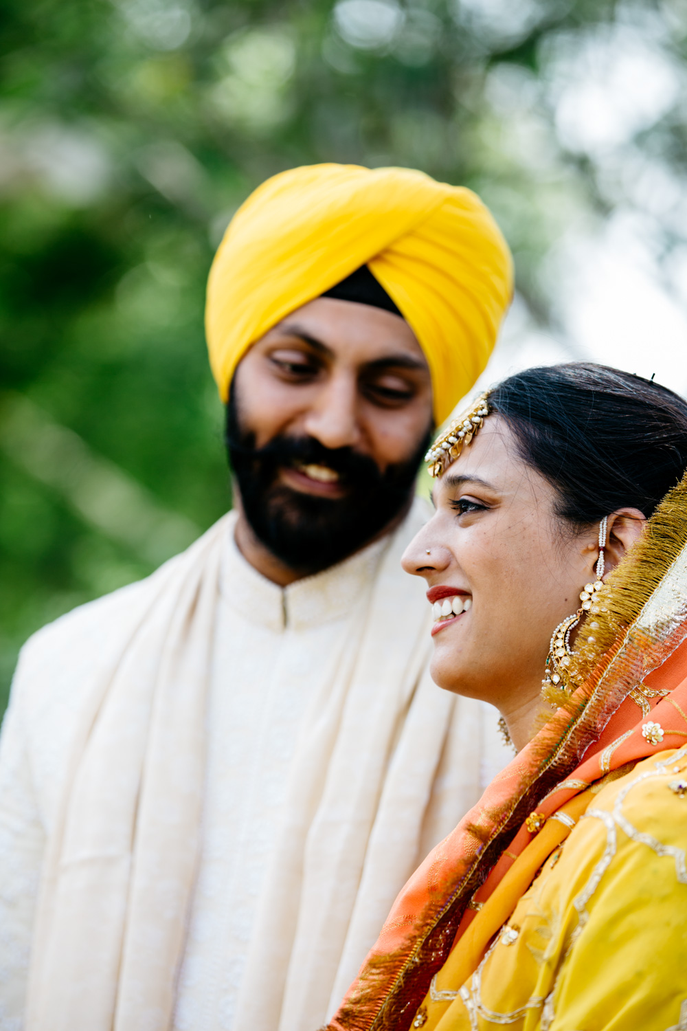 Bride smiling at groom — adoring