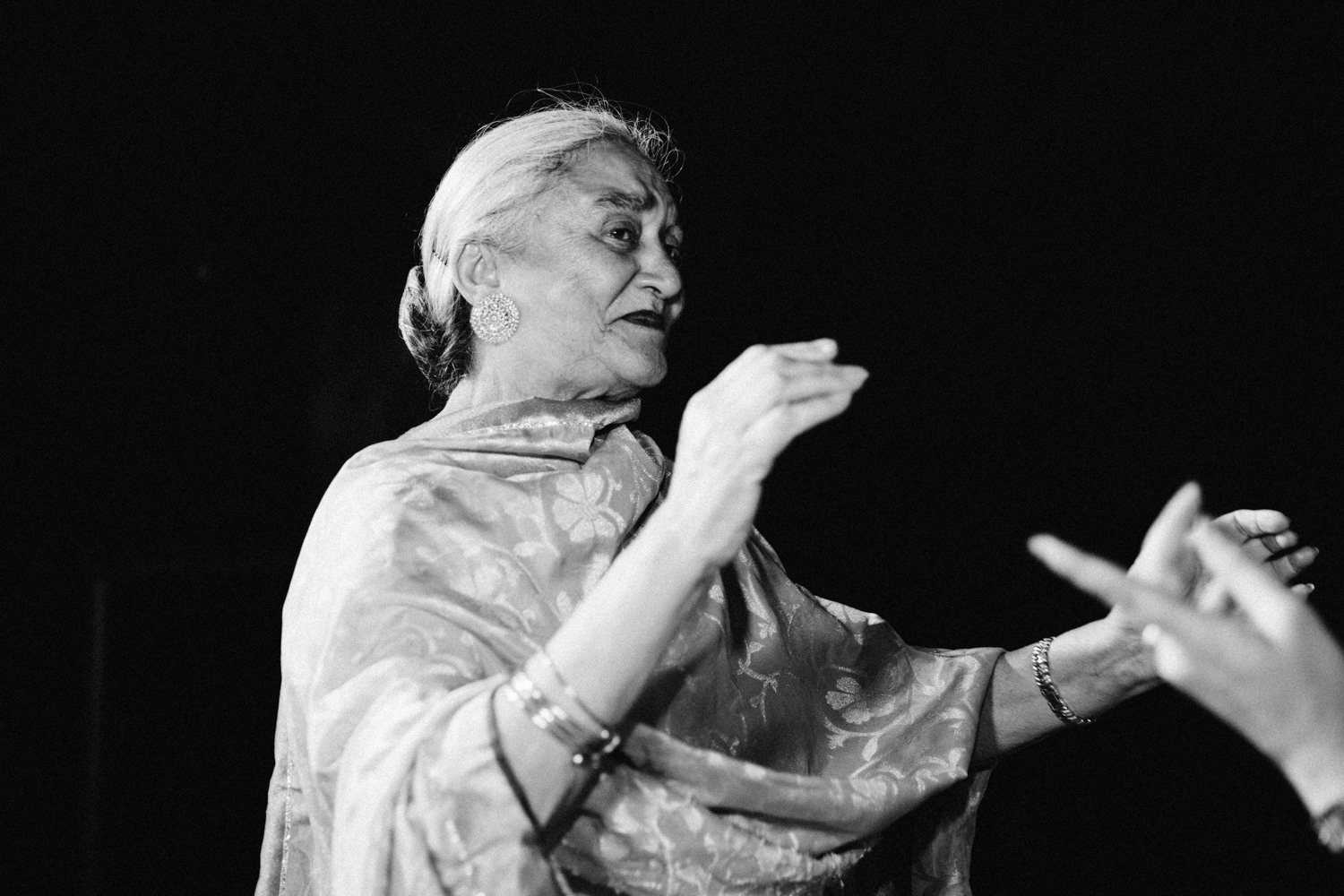 Elderly woman dancing gracefully