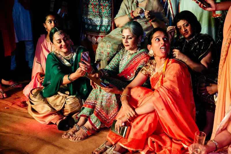 Women laughing, tongue out