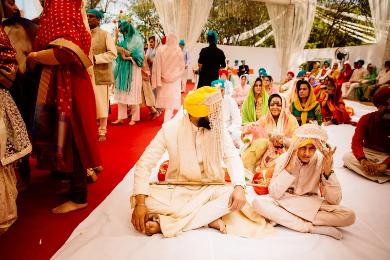Groom and boy seated